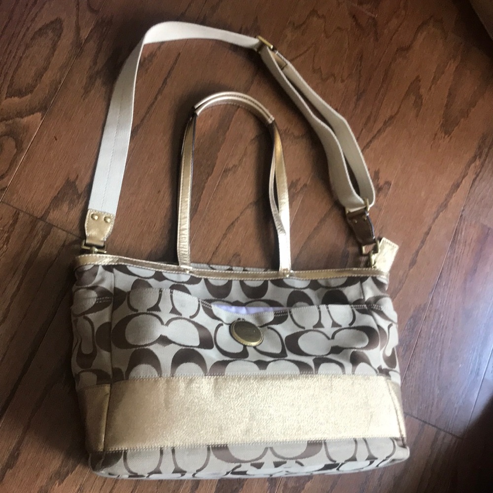 Coach “C” Logo Diaper Bag in tan, gold, and purple